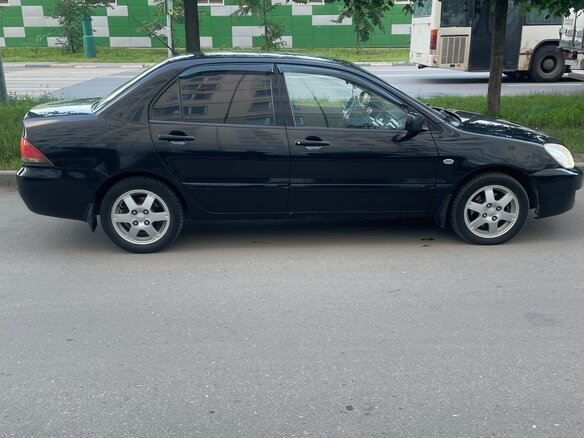2006 Mitsubishi Lancer IX Рестайлинг, чёрный, 350000 рублей - вид 1
