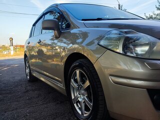 2012 Nissan Tiida I Рестайлинг, бежевый, 865000 рублей, вид 1