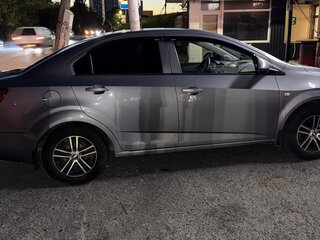 2012 Chevrolet Aveo II, серый, 535000 рублей, вид 2