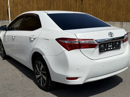 2014 Toyota Corolla XI (E160, E170, E180), белый, 1100000 рублей, вид 4