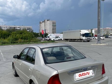 2000 Ford Laser IV, золотистый, 200000 рублей, вид 5