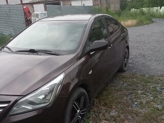 2015 Hyundai Solaris I Рестайлинг, коричневый, 880000 рублей, вид 3