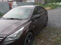 2015 Hyundai Solaris I Рестайлинг, коричневый, 880000 рублей - вид 2