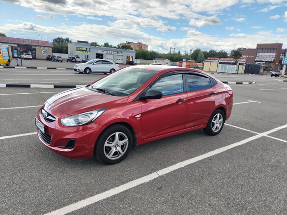 2011 Hyundai Solaris I, красный - вид 1
