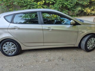 2012 Hyundai Solaris I, золотистый, 590000 рублей, вид 4