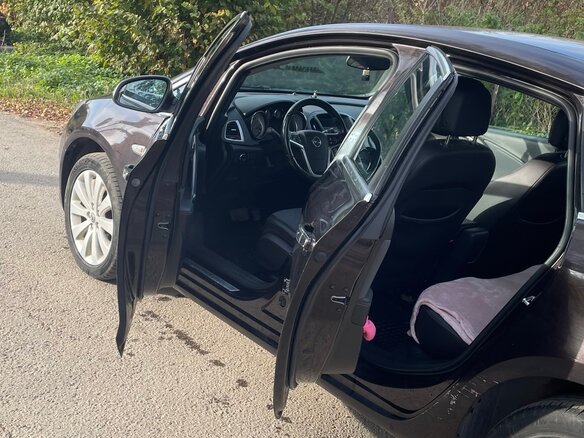 2013 Opel Astra J Рестайлинг, коричневый, 830000 рублей - вид 6