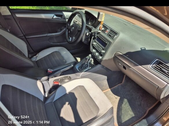 2012 Volkswagen Jetta VI, коричневый, 850000 рублей - вид 3