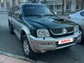 2006 Mitsubishi L200 III Рестайлинг, зелёный, 1290000 рублей - вид 1