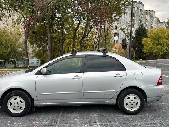 2004 Toyota Corolla IX (E120, E130) Рестайлинг, серый, 420000 рублей - вид 4