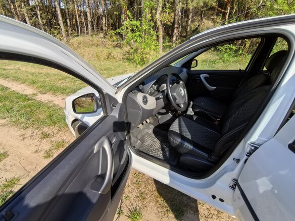 2012 Renault Logan I Рестайлинг, белый, 399000 рублей - вид 8