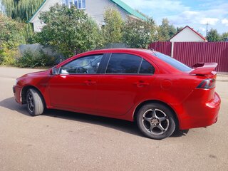2008 Mitsubishi Lancer X, красный, 657000 рублей, вид 4