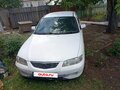 2000 Mazda Capella VI, белый, 150000 рублей - вид 5
