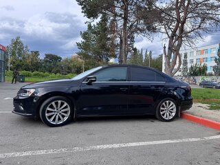 2016 Volkswagen Jetta VI Рестайлинг, чёрный, 1200000 рублей, вид 5