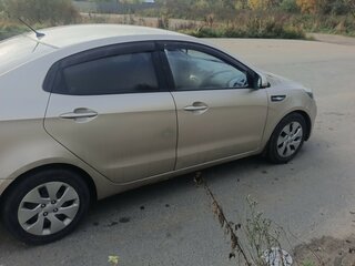 2012 Kia Rio 5-speed III, бежевый, 600000 рублей, вид 3