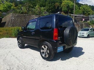 2010 Suzuki Jimny Kei car III Рестайлинг 1, чёрный, 600000 рублей, вид 3