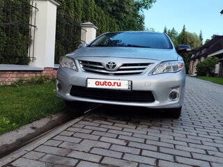 2010 Toyota Corolla X (E140, E150), серебристый, 620000 рублей, вид 2