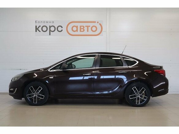 2013 Opel Astra J Рестайлинг, коричневый - вид 1