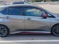 2019 Nissan Note Nismo e-Power II Рестайлинг, серый - вид 1