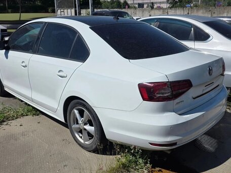 2016 Volkswagen Jetta VI Рестайлинг, белый, 862000 рублей, вид 2