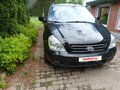 2009 Kia Carnival Grand II, чёрный, 850000 рублей - вид 1
