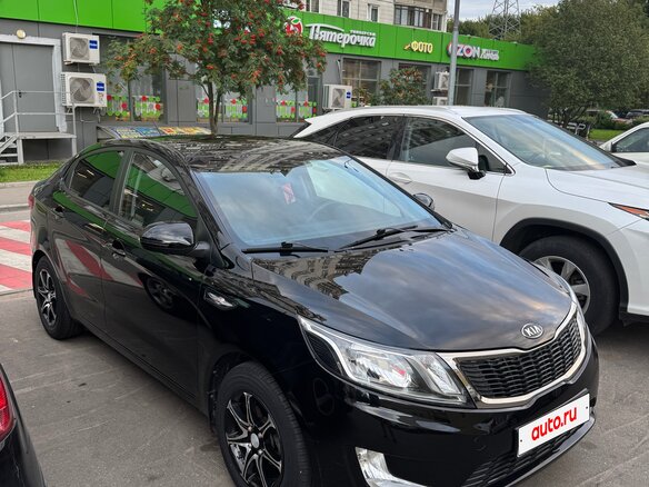 2012 Kia Rio 5-speed III, чёрный, 1050000 рублей - вид 6
