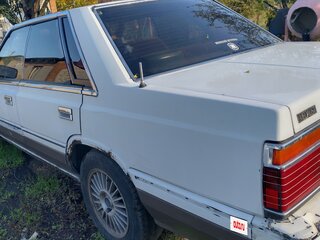 1986 Nissan Laurel V (C32), белый, 297000 рублей, вид 3