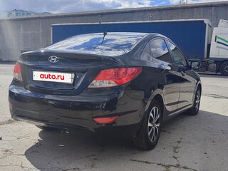 2011 Hyundai Solaris I, чёрный, 670000 рублей, вид 4