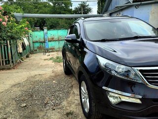 2011 Kia Sportage III, чёрный, 1350000 рублей, вид 3