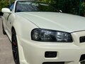 2002 Nissan Skyline GT-R X (R34), белый, 43500000 рублей - вид 8