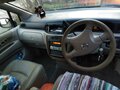 2002 Nissan Prairie III (M12), чёрный - вид 1