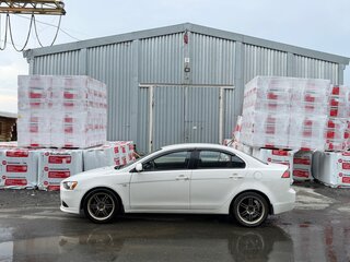 2014 Mitsubishi Lancer X Рестайлинг, белый, 799000 рублей, вид 2
