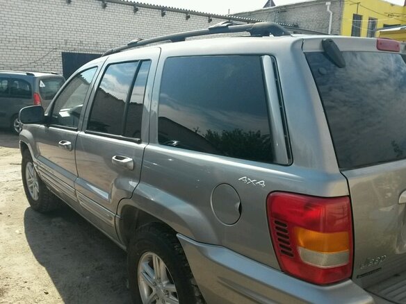 2000 Jeep Grand Cherokee II (WJ), серебристый - вид 1