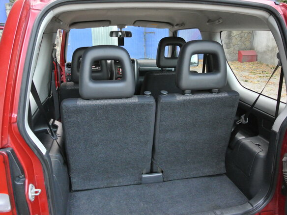 2011 Suzuki Jimny III Рестайлинг 1, красный - вид 4