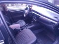 2013 Toyota Corolla XI (E160, E170, E180), чёрный, 1650000 рублей - вид 4