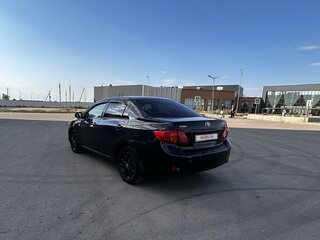 2008 Toyota Corolla AMT X (E140, E150), чёрный, 700000 рублей, вид 3