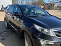 2012 Kia Sportage III, чёрный, 1350000 рублей