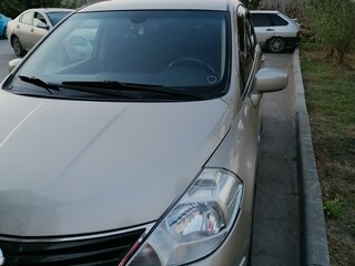 2011 Nissan Tiida I Рестайлинг, коричневый, 890000 рублей, вид 2