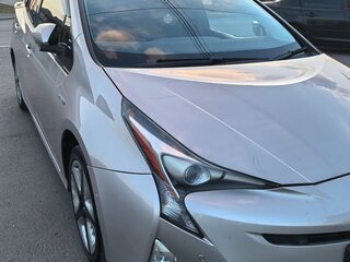 2016 Toyota Prius IV (XW50), золотистый, 1780000 рублей, вид 2
