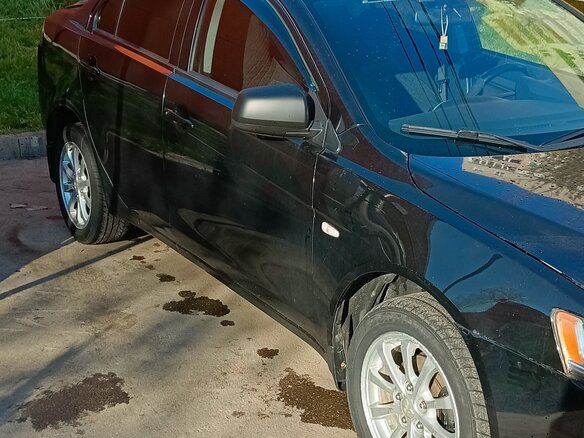 2010 Mitsubishi Lancer X, чёрный, 770000 рублей - вид 6
