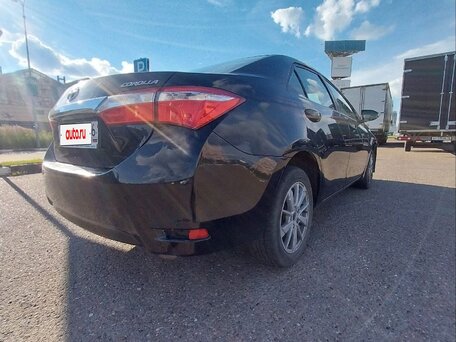 2013 Toyota Corolla XI (E160, E170, E180), чёрный, 999999 рублей, вид 5