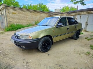 2006 Daewoo Nexia I, бежевый, 230000 рублей, вид 1