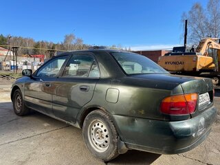 1997 Mitsubishi Carisma I, зелёный, 135000 рублей, вид 3