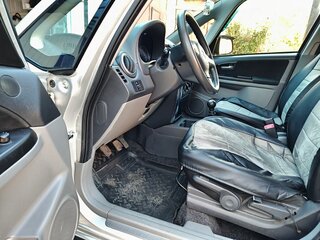 2011 Suzuki SX4 I (Classic) Рестайлинг, серебристый, 850000 рублей, вид 4