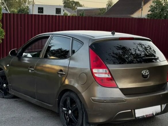 2011 Hyundai i30 I Рестайлинг, коричневый, 430000 рублей - вид 7