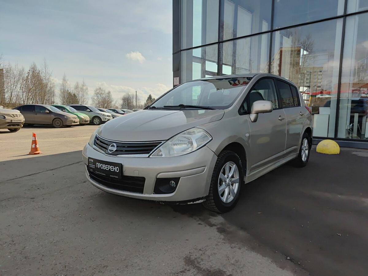 Открыть фотографии: Nissan Tiida I Рестайлинг