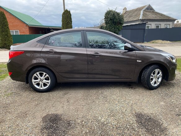 2014 Hyundai Solaris I Рестайлинг, коричневый, 1150000 рублей - вид 3