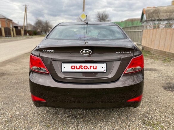 2014 Hyundai Solaris I Рестайлинг, коричневый, 1150000 рублей - вид 5