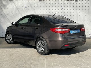 2014 Kia Rio 6-speed III, коричневый, 855000 рублей, вид 5
