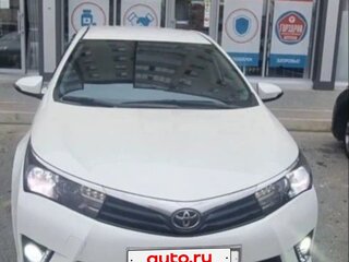2014 Toyota Corolla XI (E160, E170, E180), белый, 1450000 рублей, вид 1