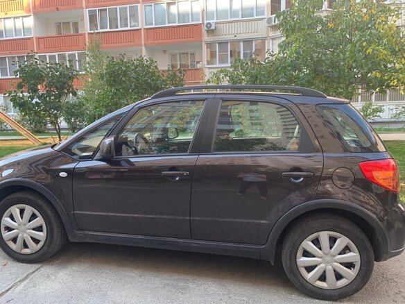 2014 Suzuki SX4 I (Classic) Рестайлинг, коричневый, 1000000 рублей - вид 2